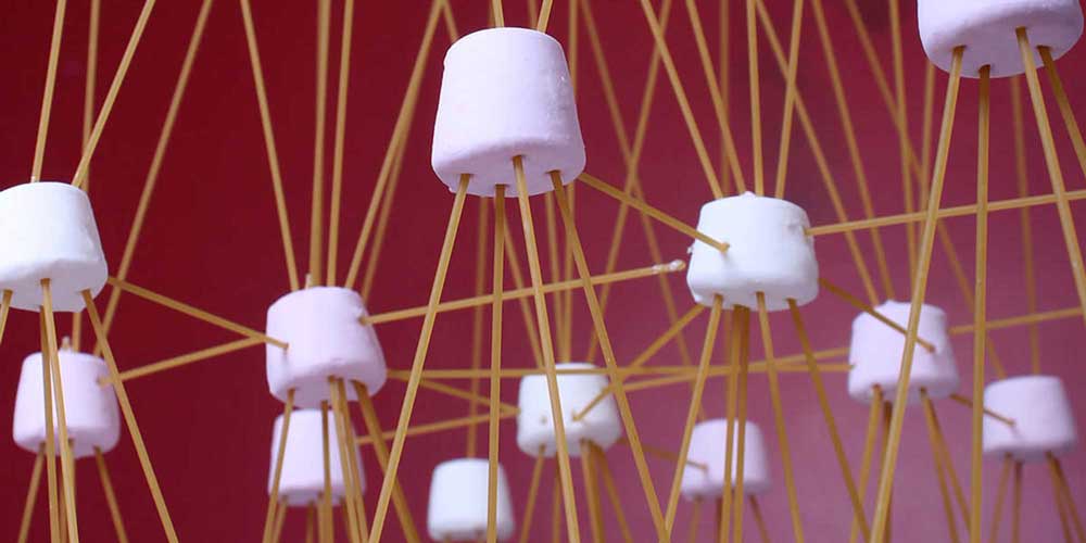 A spaghetti and marshmallow tower